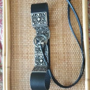 Unique black leather belt.